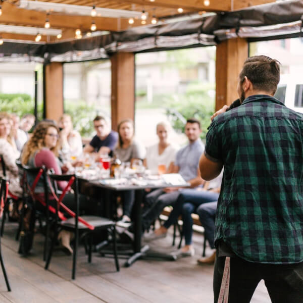 Man speaking at community event