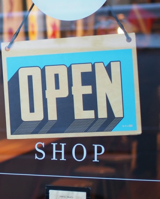 open signage on business front window